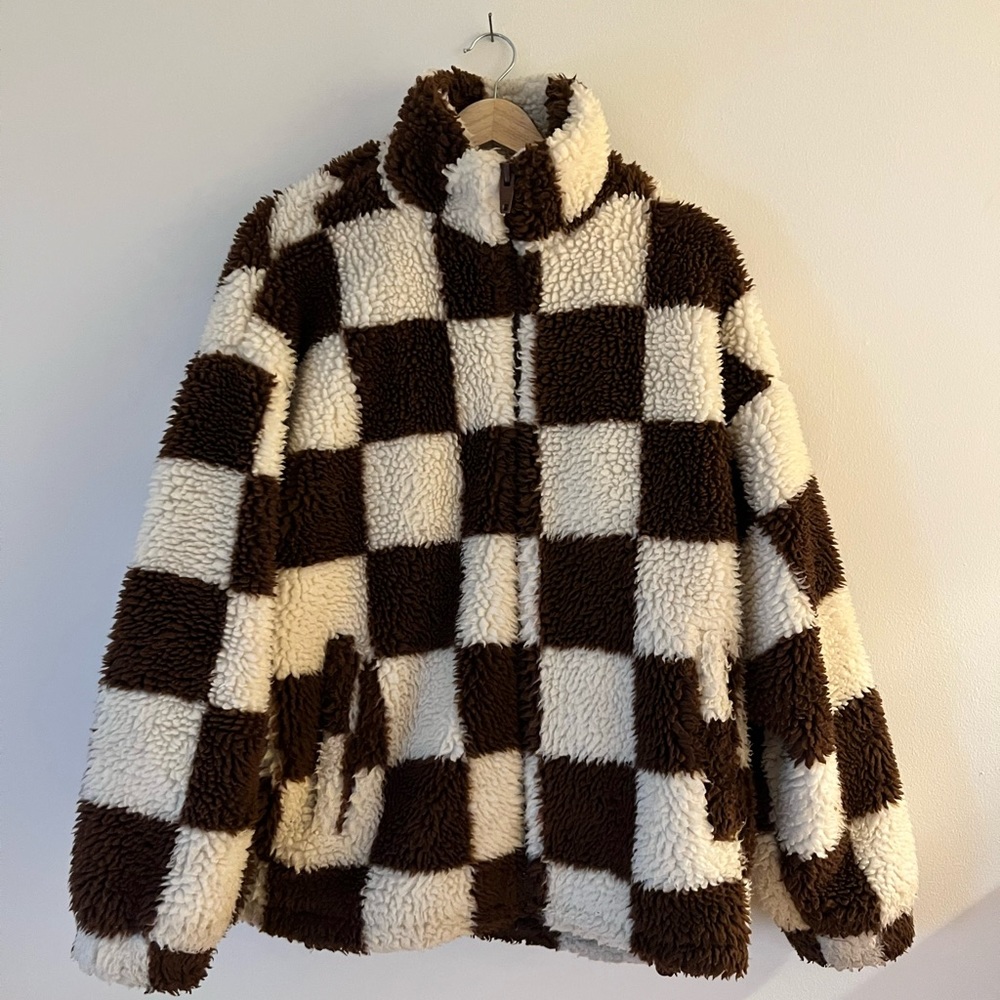 A checkered brown and white jacket from Zara.